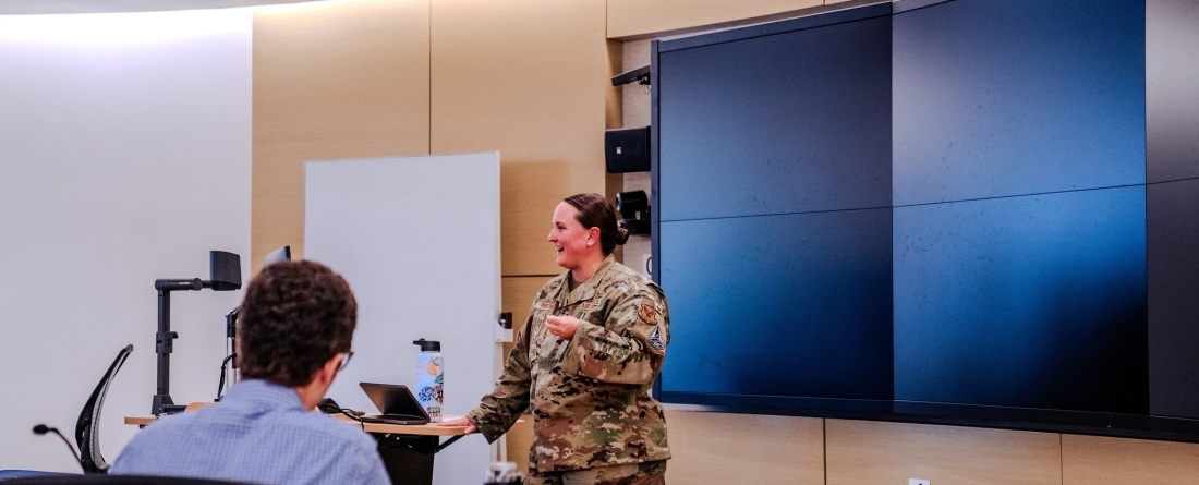 Picture of Lt. Col. Elisha Pippin Speaking at CISSM Forum. 